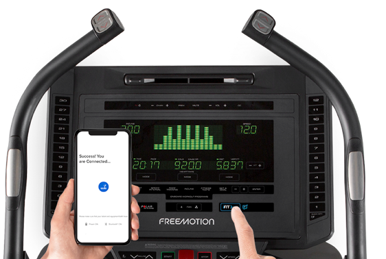 A user pairs their mobile device with a Freemotion equipment console.