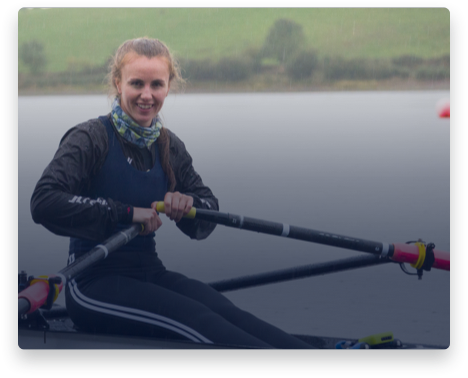 iFit Trainer Aifric Keogh rowing on the water in Ireland.