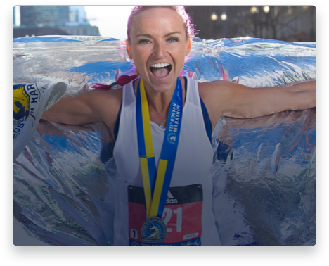 iFit Trainer Ashley Paulson leading a workout in Boston at the Boston Marathon.