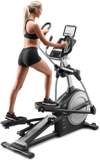 Woman working out on an elliptical.