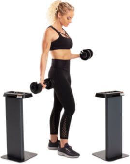 A woman lifting dumbbells.